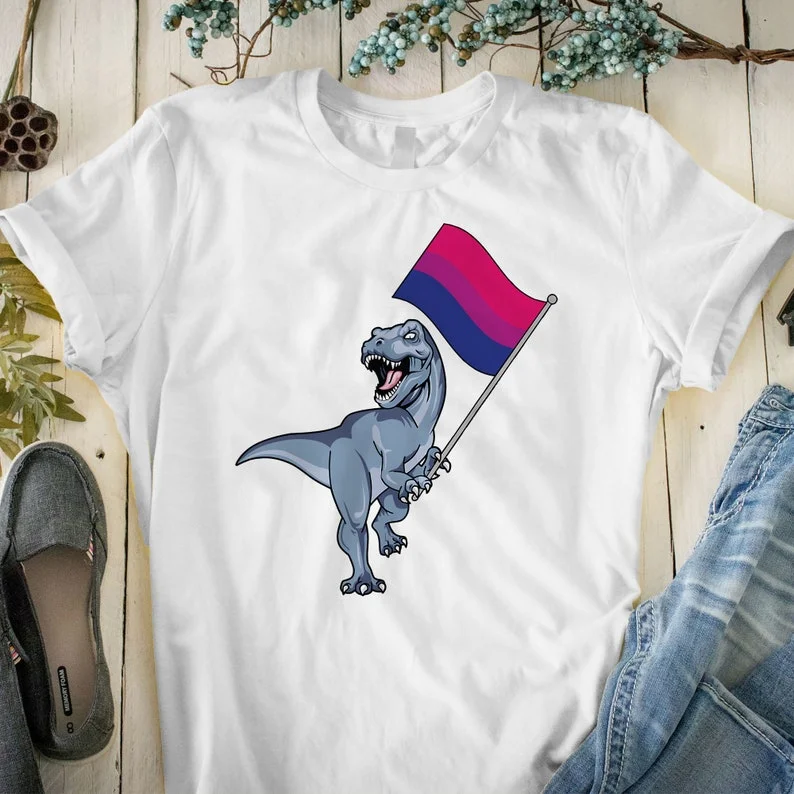 Graphic pride t-shirts with embroidered rainbow hearts--Dinosaur T-rex Gay Pride Flag LGBT, Lesbian Bisexual T-Shirt, Rainbow Pride Shirt Graphic pride t-shirts with embroidered rainbow hearts--Dinosaur T-rex Gay Pride Flag LGBT, Lesbian Bisexual T-Shirt, Rainbow Pride Shirt